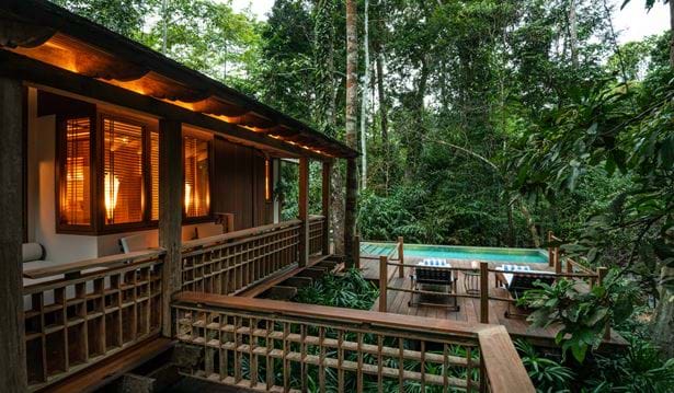 rainforest pool villa with a pool patio and private pool