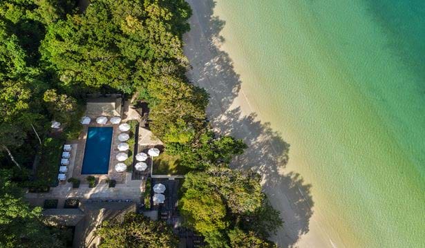 aerial view of the family pool next just steps away from the beach
